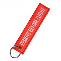 Keyring REMOVE BEFORE FLIGHT red Keyring REMOVE BEFORE FLIGHT red