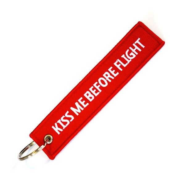 Keyring KISS ME BEFORE FLIGHT red