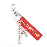 Keyring KISS ME BEFORE FLIGHT small red