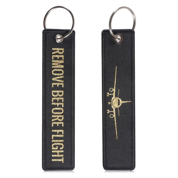 Key Ring “REMOVE BEFORE FLIGHT” gold, with plane