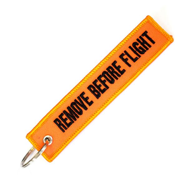 Keyring REMOVE BEFORE FLIGHT orange