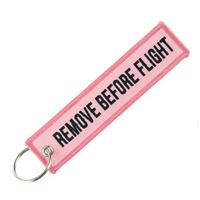 Keyring REMOVE BEFORE FLIGHT light pink
